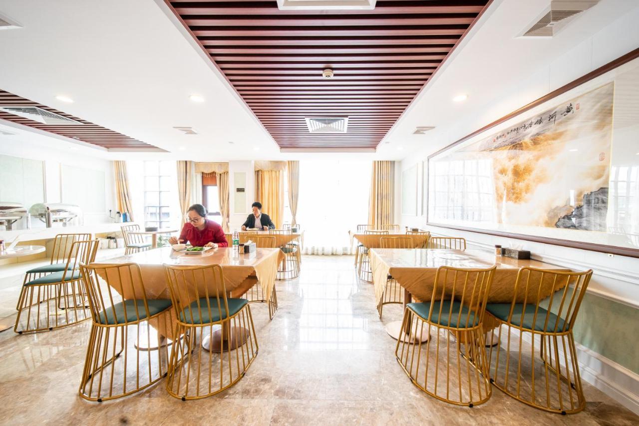 Zhongbo Art Hotel Kuangcsou Kültér fotó