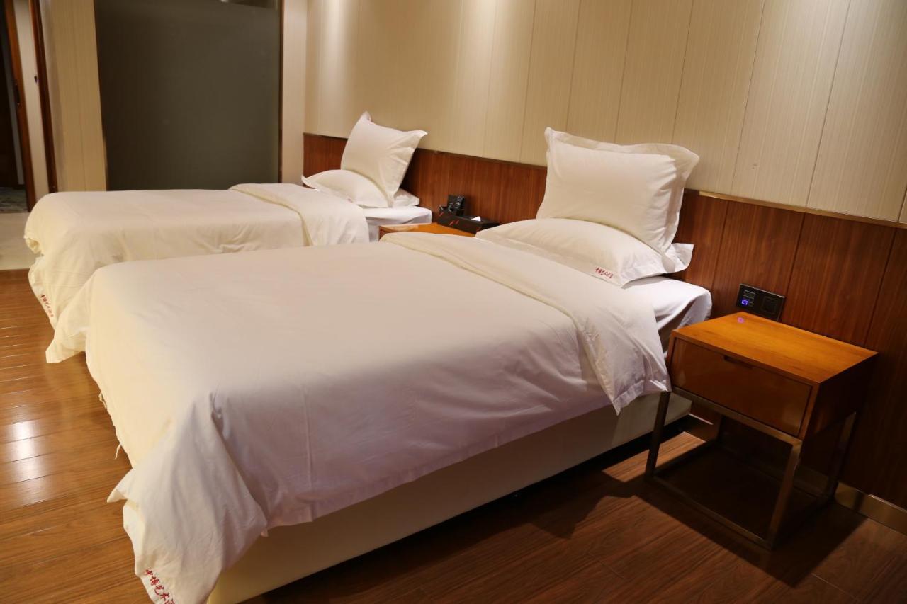 Zhongbo Art Hotel Kuangcsou Kültér fotó